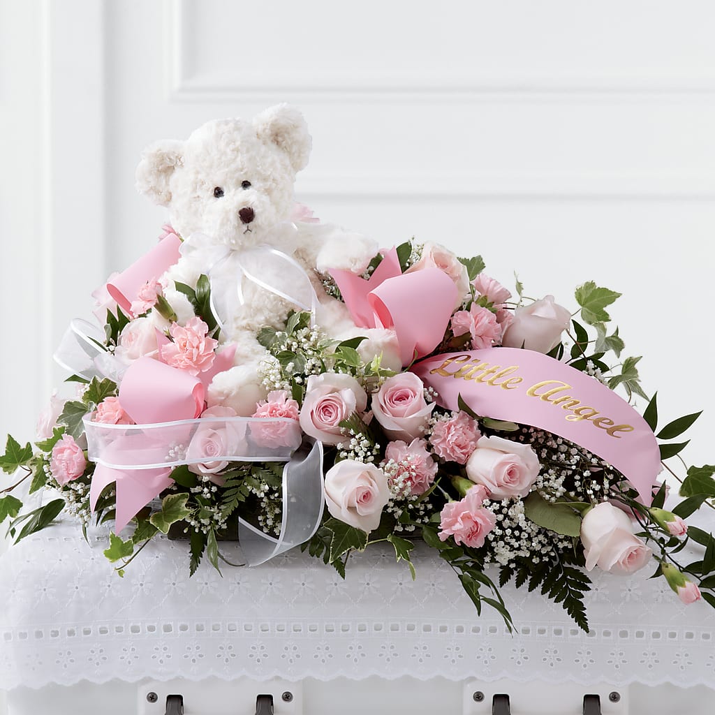 Touch of Sympathy Casket Spray – Flowers By Helen, Forsyth GA